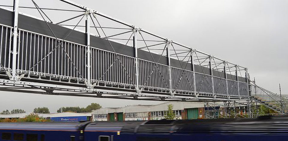 HAKI-Bridge-System-walkway-pedestrian-train-station-public-access-enigma